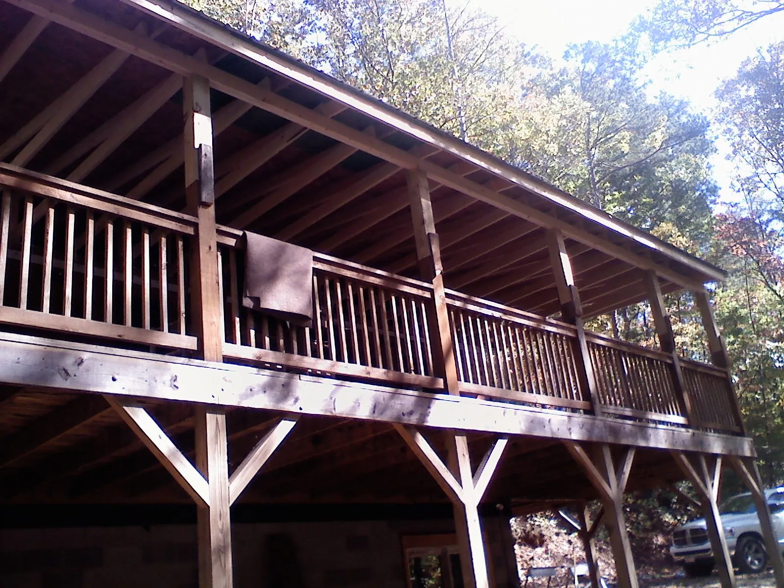 Timber framing under a new elevated porch and deck — Roof Leak Repair in Transfer by Roofing Brothers